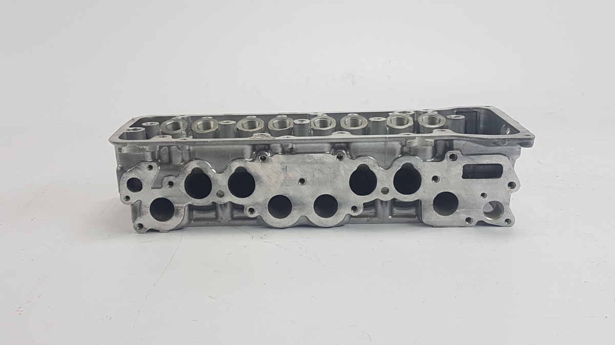 Головка блока цилиндров 21214/2123 под датчик фаз голая без шпилек